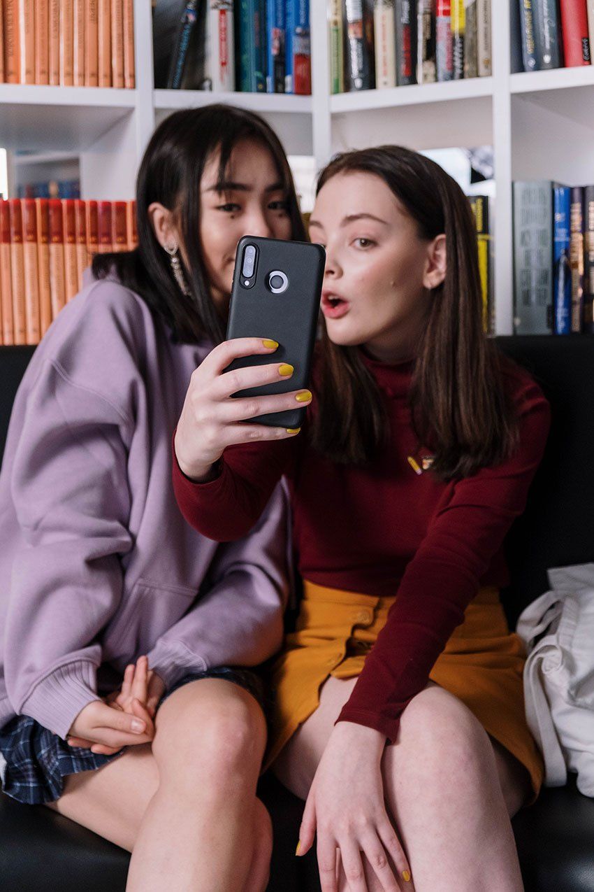 two ladies using the No Face No Filter app Truth Tara™