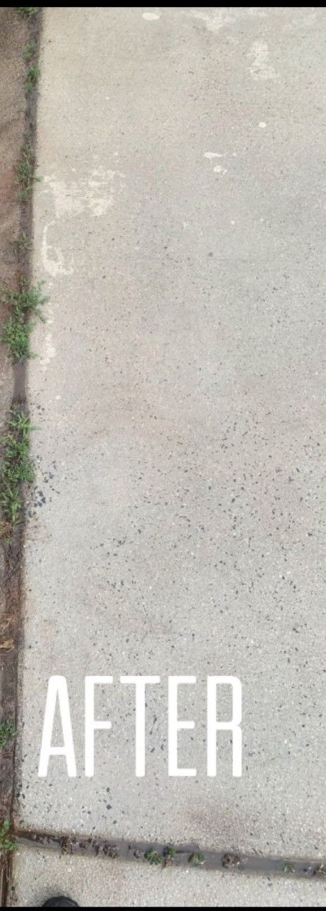 A concrete sidewalk with the words `` after '' written on it.