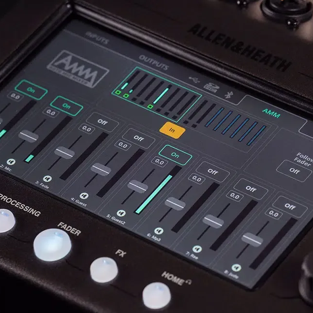 Close-up of a digital audio mixer screen displaying input and output faders, with