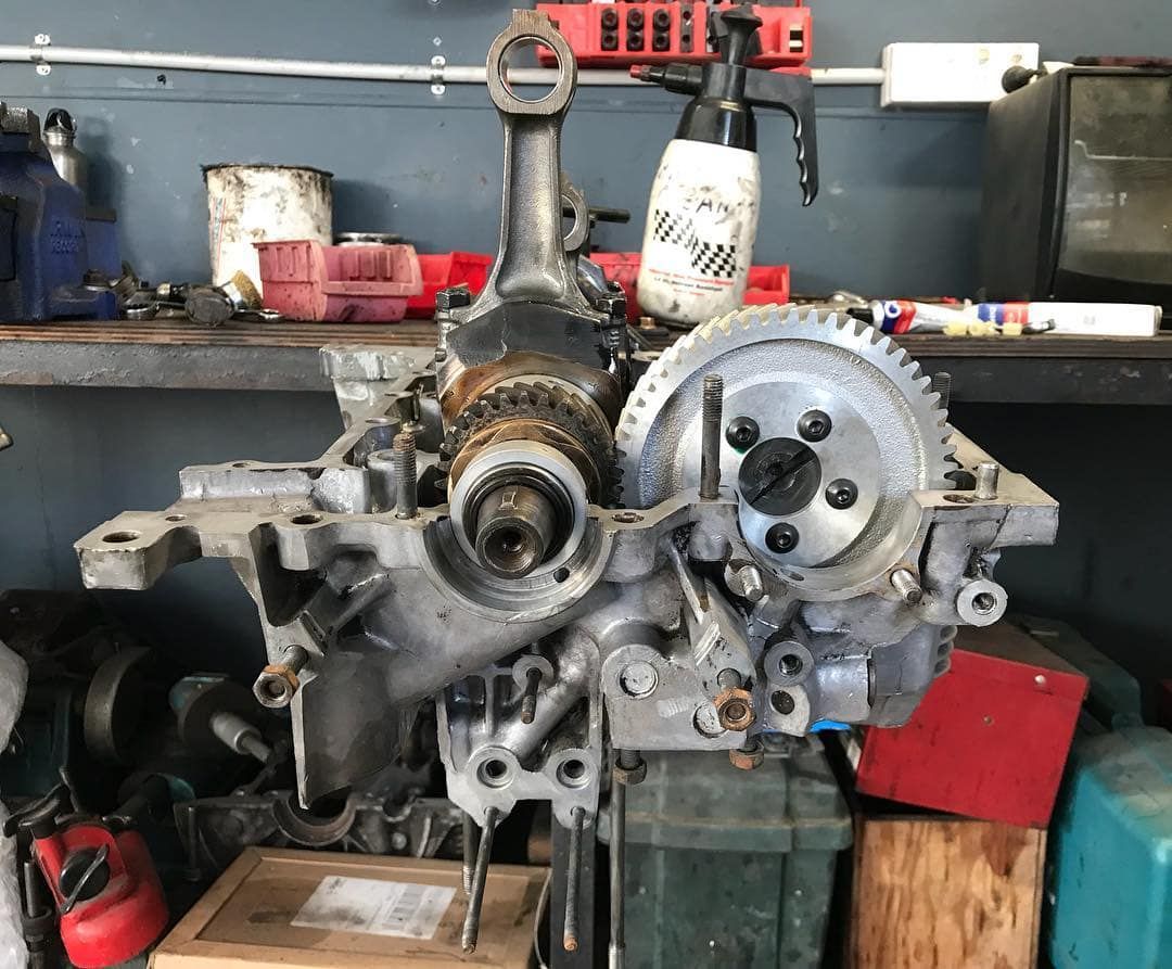 A Very Old Engine is Sitting on a Table in a Garage — Stokers VW Mechanical Servicing & Repairs in Byron Bay, NSW
