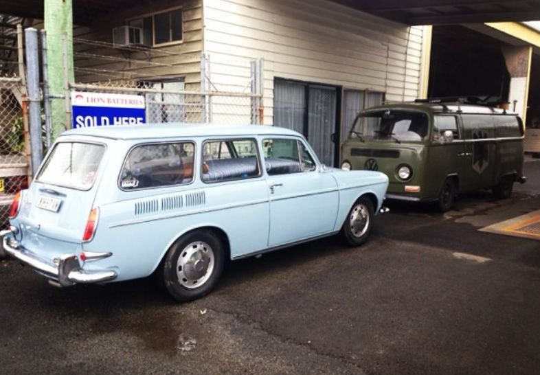 Two Cars Are Parked in Front of a Building With a Sold Sign — Stokers VW Mechanical Servicing & Repairs in Byron Bay, NSW