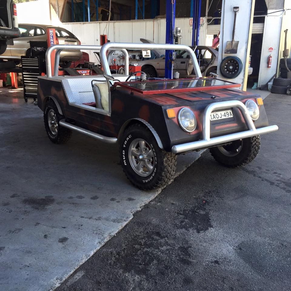 A Black and Red Jeep With a License Plate — Stokers VW Mechanical Servicing & Repairs in Byron Bay, NSW
