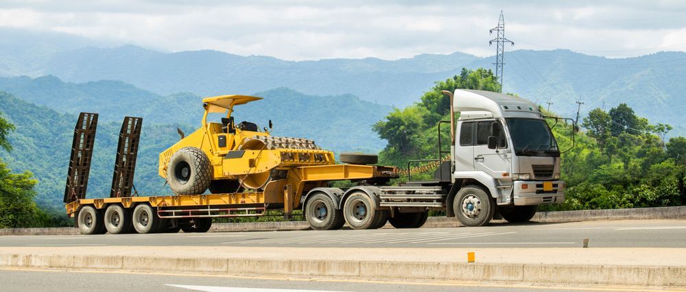 A Row Of Trailers Are Parked In A Parking Lot — Eclipse Hire In Cairns, QLD