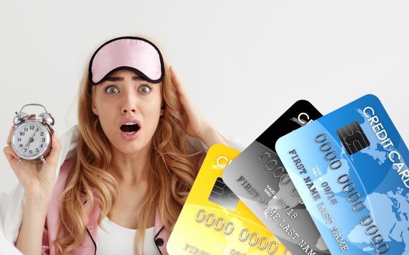 A woman holding an alarm clock worrying about Late Payments Can Affect Your Credit.