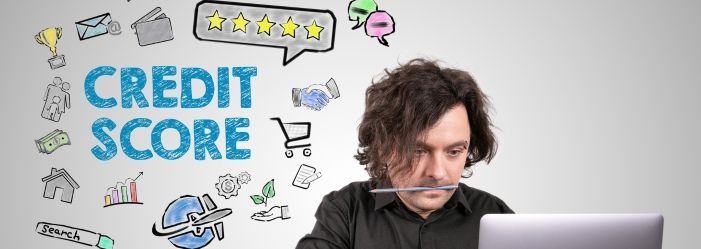 A man is sitting in front of a laptop computer and a credit score background emphasizing the idea of Will Debt Relief ruin my credit score