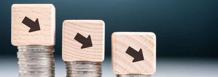 three wooden blocks with arrows on them are stacked on top of each other Aiming for APRs below 15%.