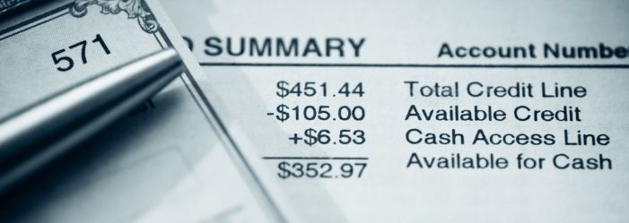 A close-up of a bank statement with a pen on top of it emphasizing How Will You Keep Your Credit Records?