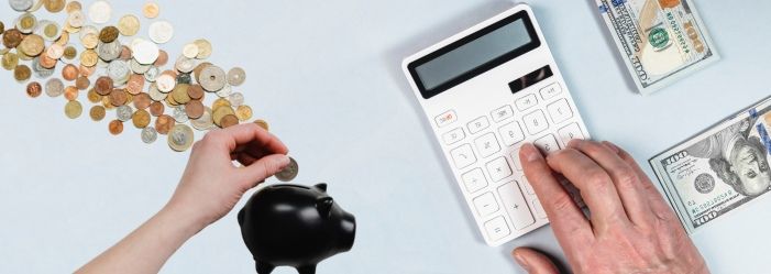 An Image emphasizing a comprehensive financial planning scene with a detailed budget laid out on a table, accompanied by a piggy bank, symbolizing the importance of savings and smart money management across various life stages