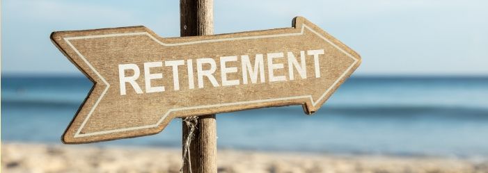 An image of an arrow sign pointing forward, symbolizing becoming debt-free before reaching retirement.