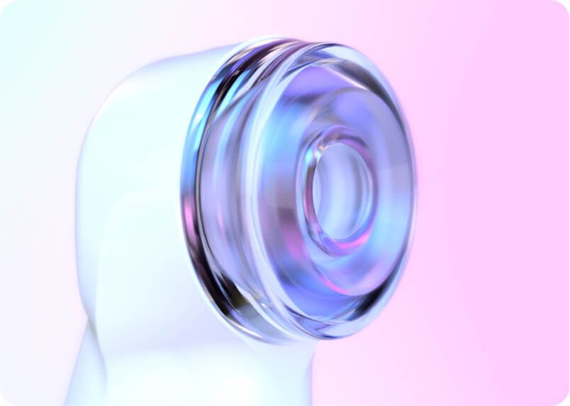 Close-up of a clear, cylindrical object with concentric rings, in a pastel gradient setting.