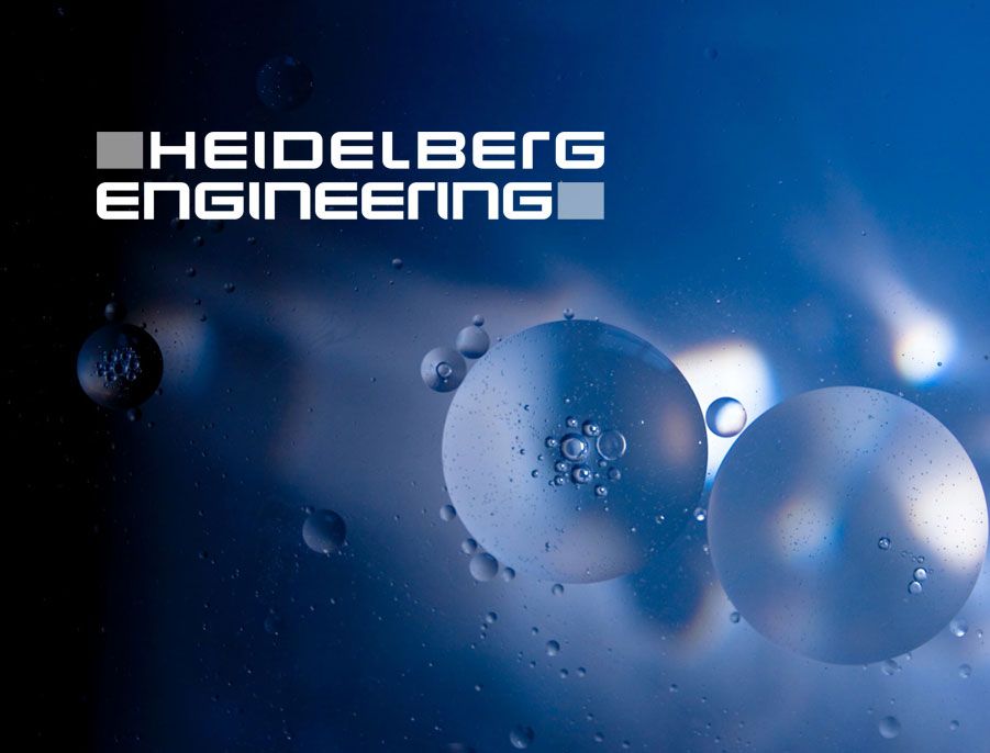 Heidelberg Engineering logo over a blue background of orbs and bubbles, possibly representing the eye.