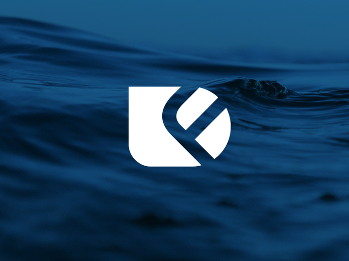 Blue ocean waves with a white abstract logo centered over the water.