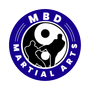 MBD Martial Arts logo with blue ring and black-and-white martial arts silhouette