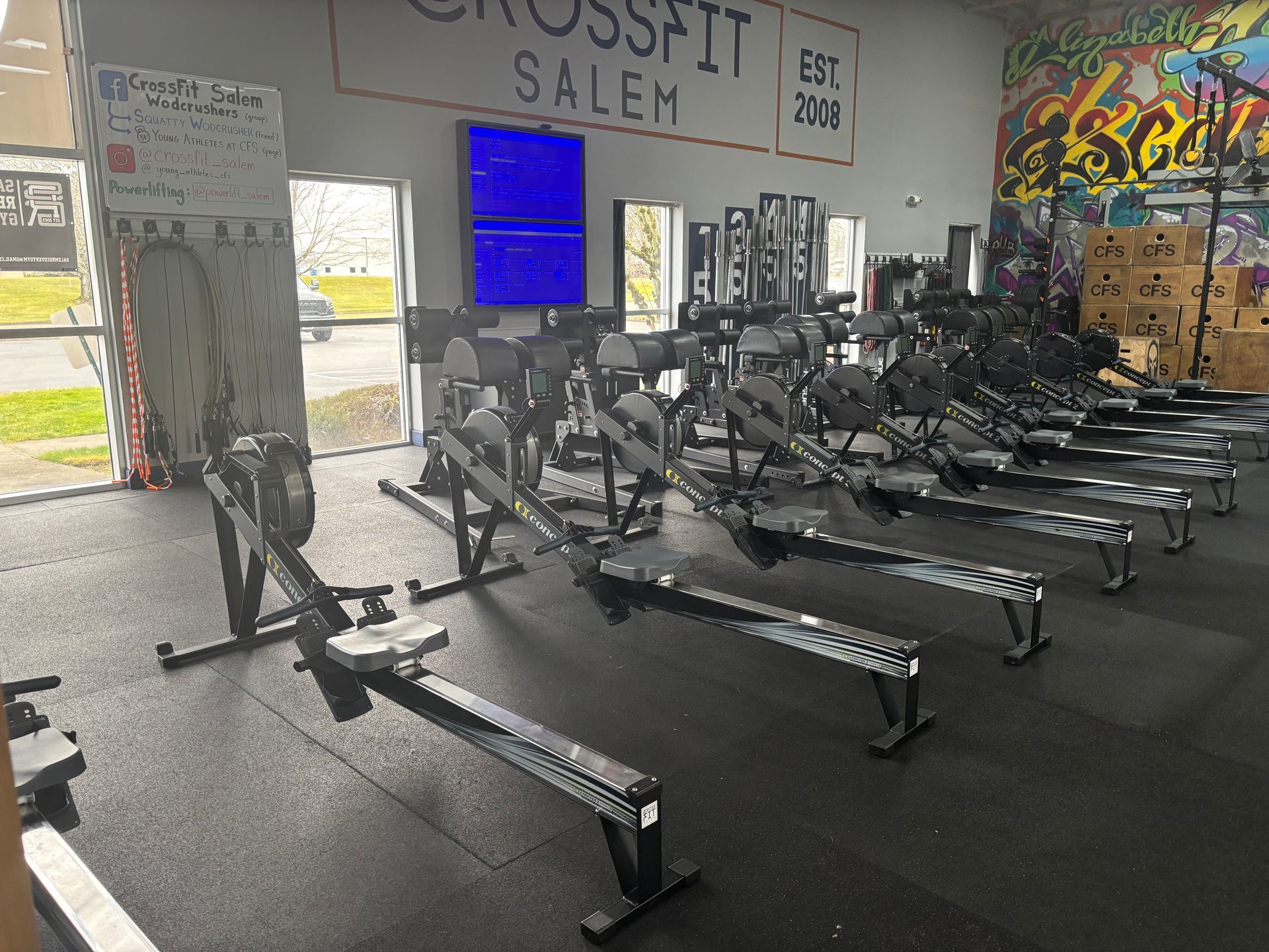 There are a lot of rowing machines in this gym.