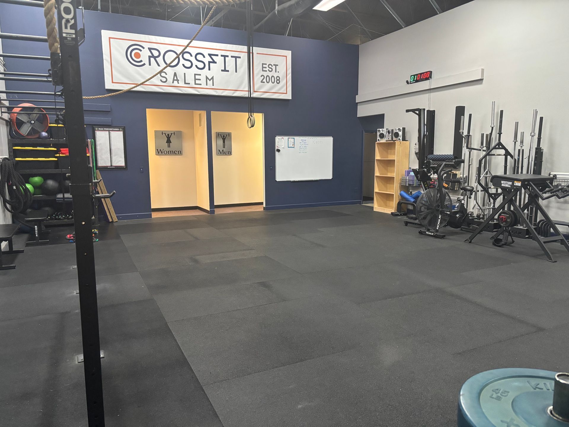 A gym with a sign that says crossfit salem