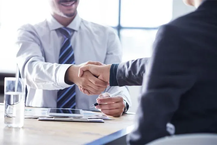 Shaking Hands —  Washington, MO — Wiemann & Pues Insurance Agency