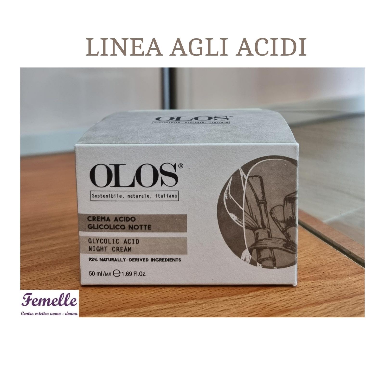 Scatola di crema antiacida OLoS su tavolo di legno con la scritta