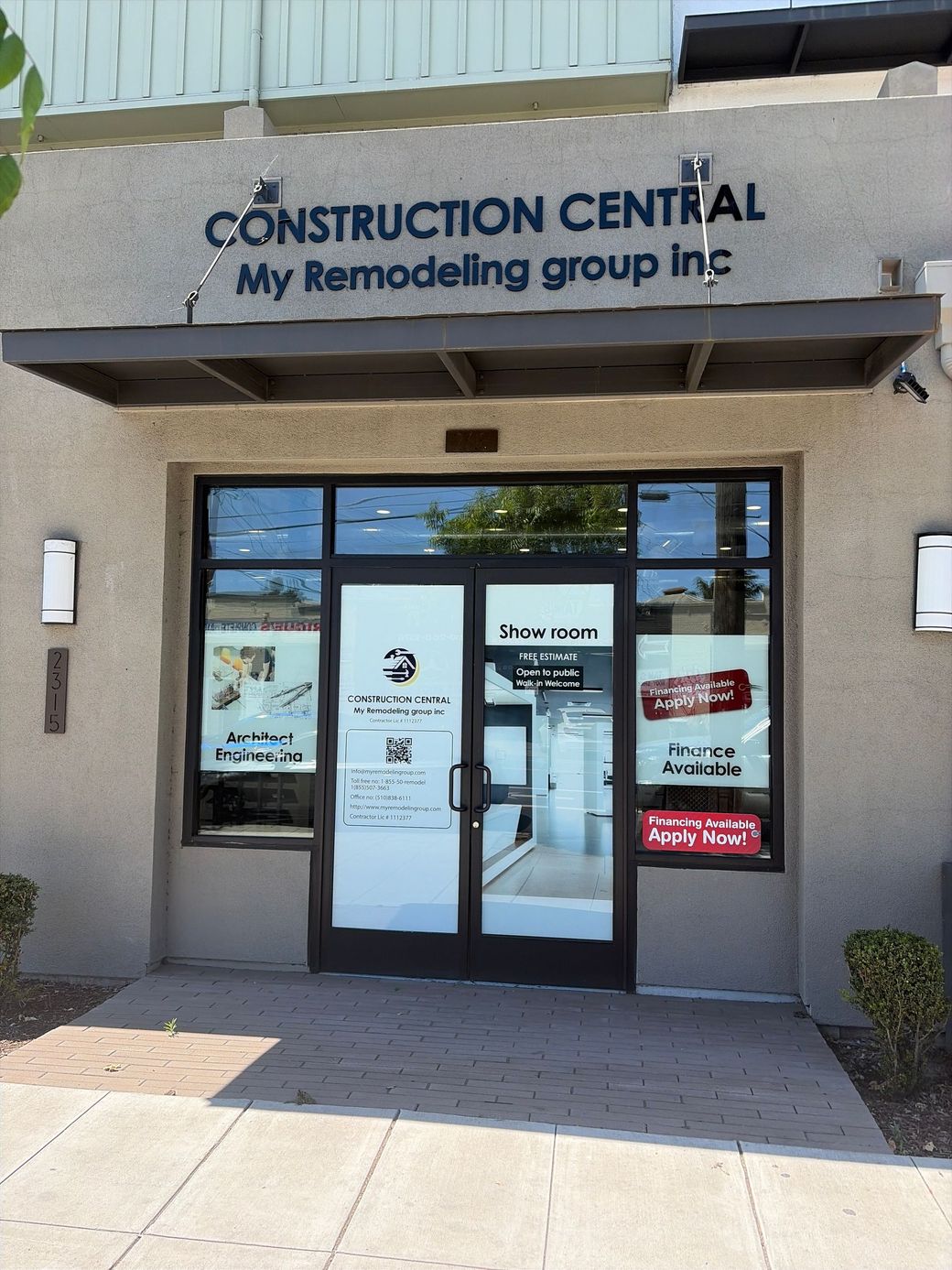 Storefront for Construction Central remodeling group with glass doors and windows.