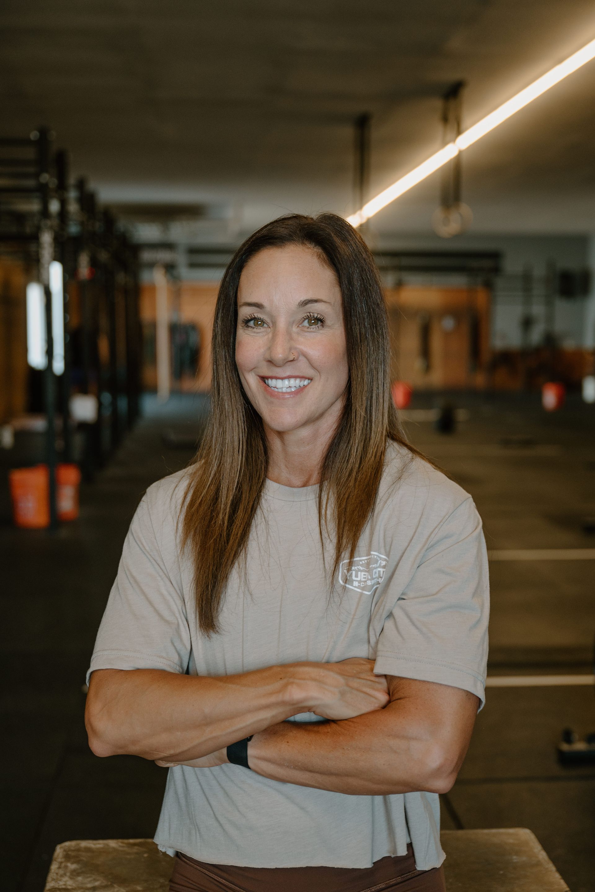 Yuba City CrossFit coach smiling in the gym.
