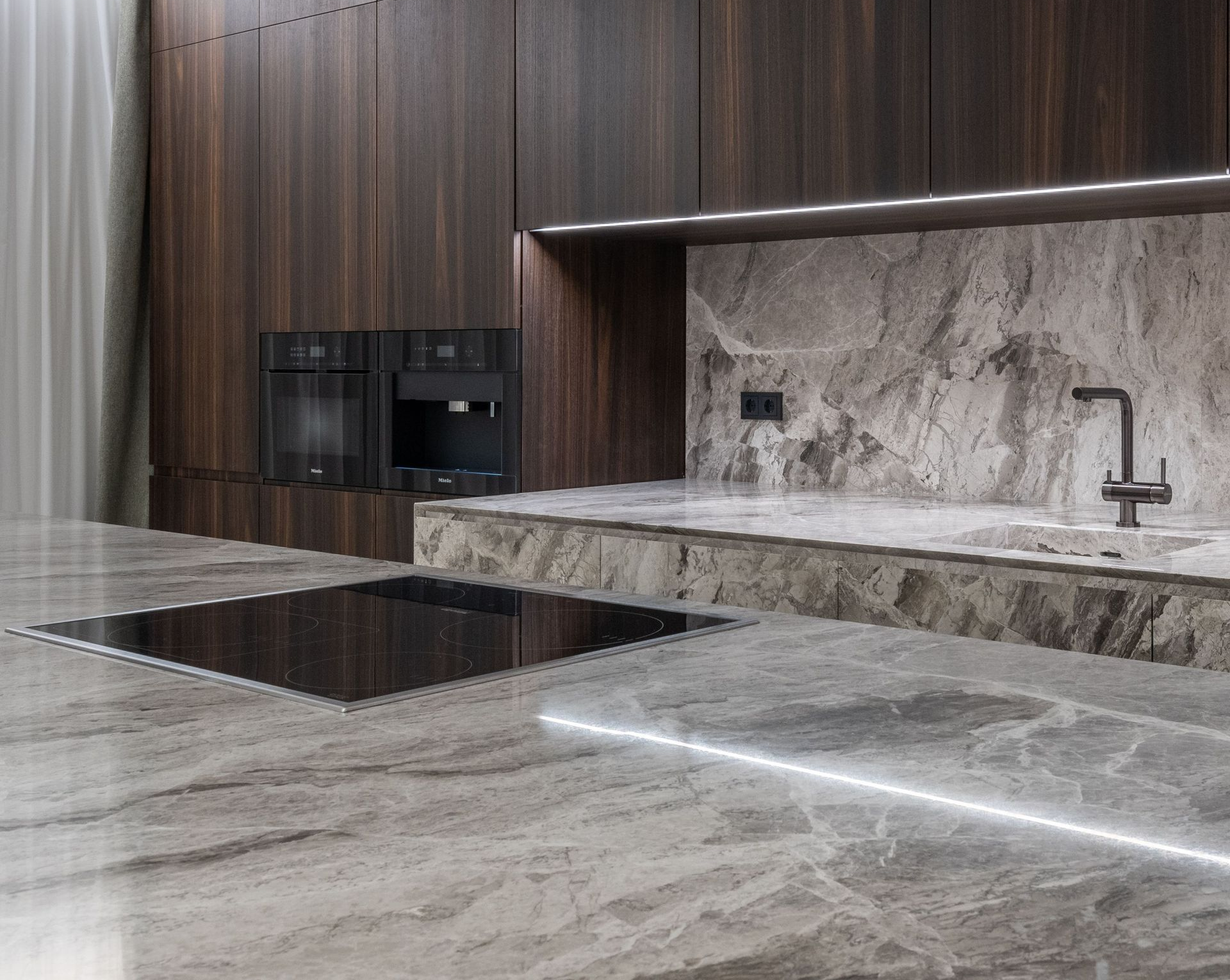 Marble kitchen countertops with wooden cabinets