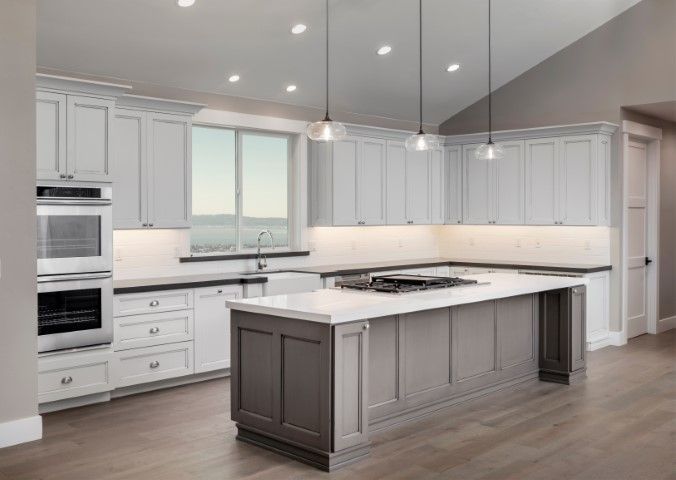 A remodeled kitchen, including island with a built-in stove