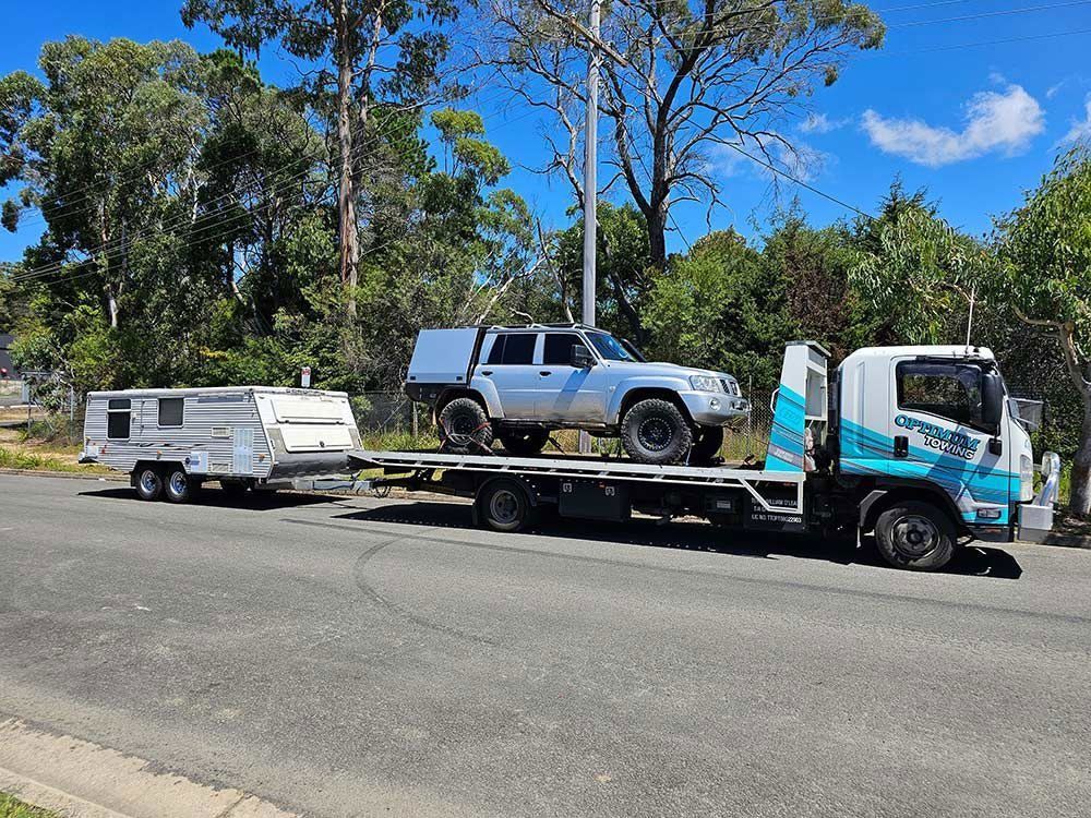Tow Truck with Car on Top in Nowra
