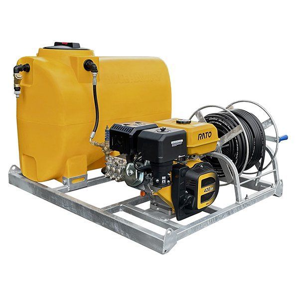 A yellow tank with a motor attached to it.