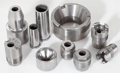 There are many different types of metal pieces on the table.