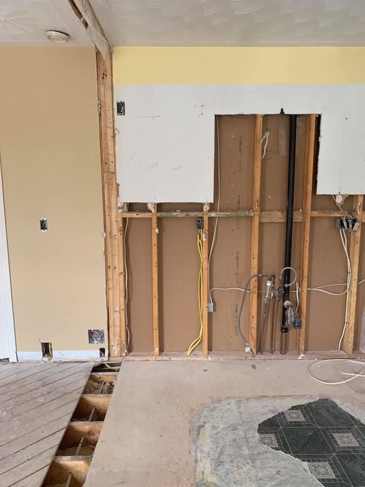 There is a hole in the wall in the middle of the room.