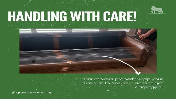 Worker wrapping furniture in clear plastic with a green “Handling with care!” warning banner.