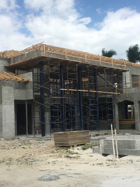 Under Construction Building With Scaffolding — Miami, FL — J & M Scaffolds of Florida