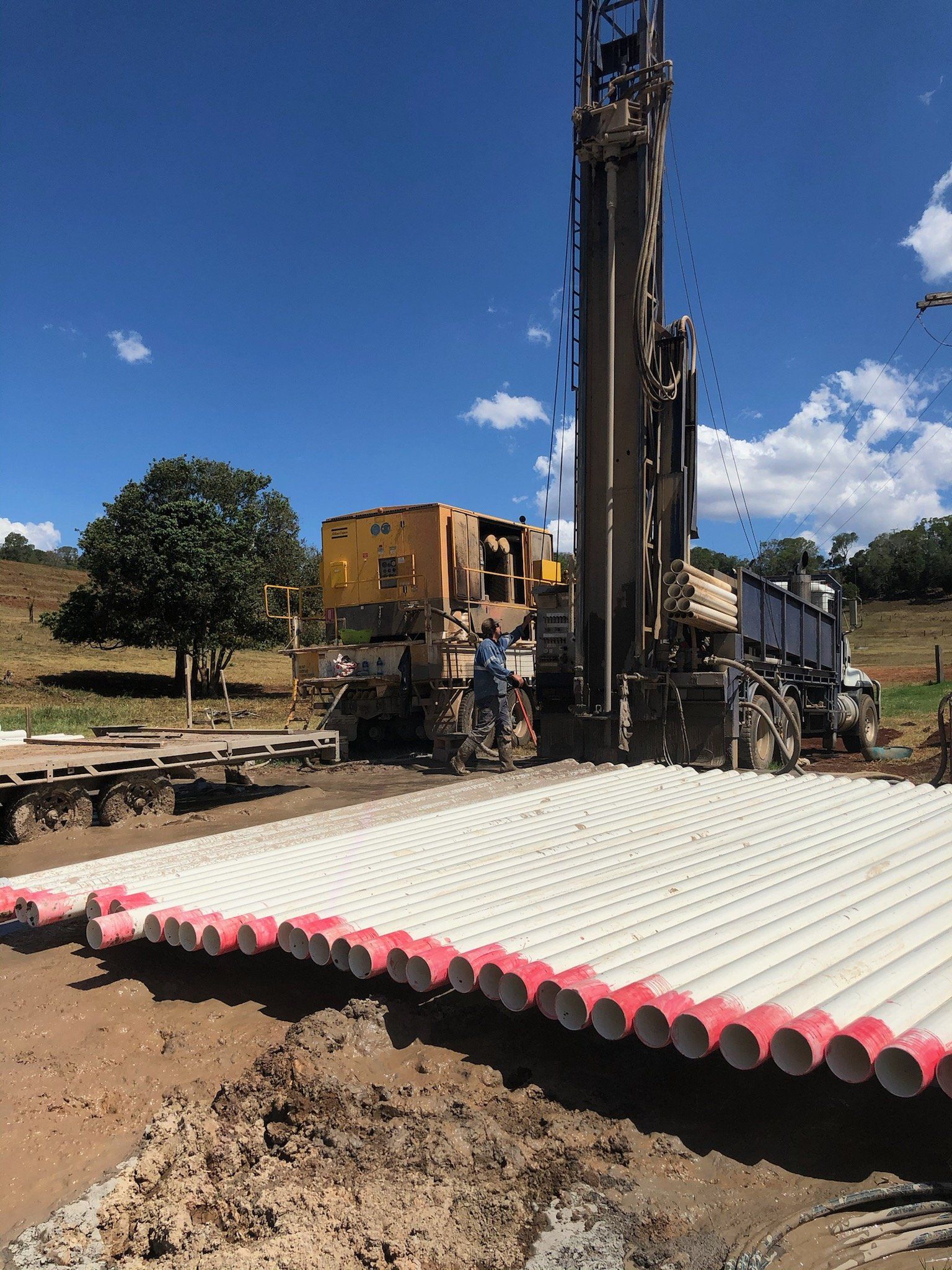 man operating drilling rig