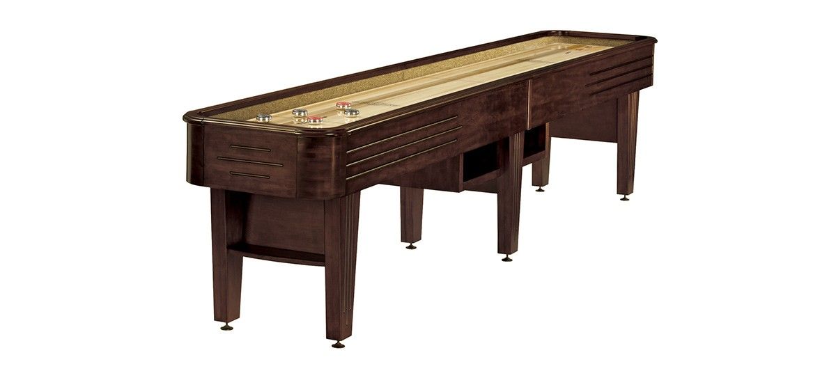 Long wooden board game table with pockets and legs, resembling a shuffleboard or billiards table