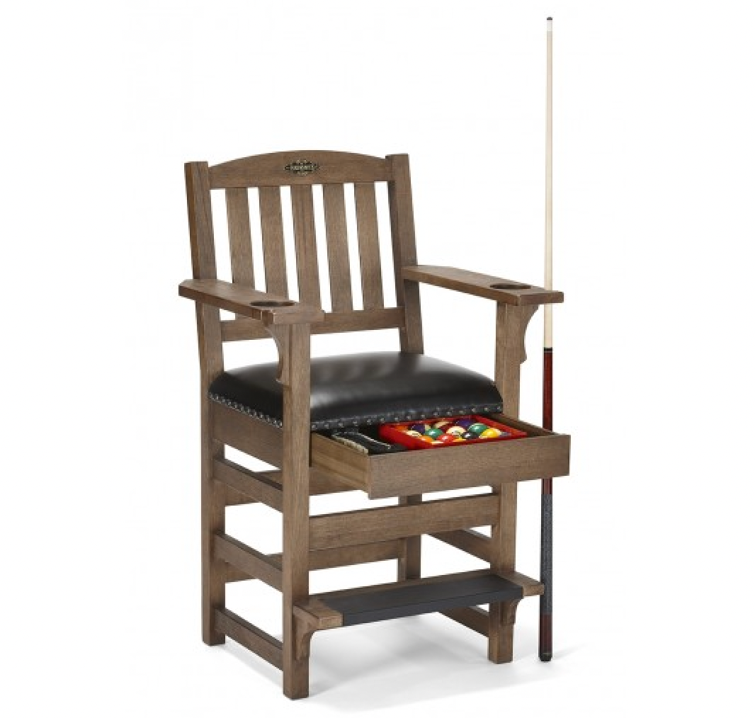 Wooden chair with armrests, black seat cushion, and a colorful woven basket under the seat