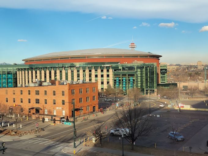 An aerial view of a large building in a city