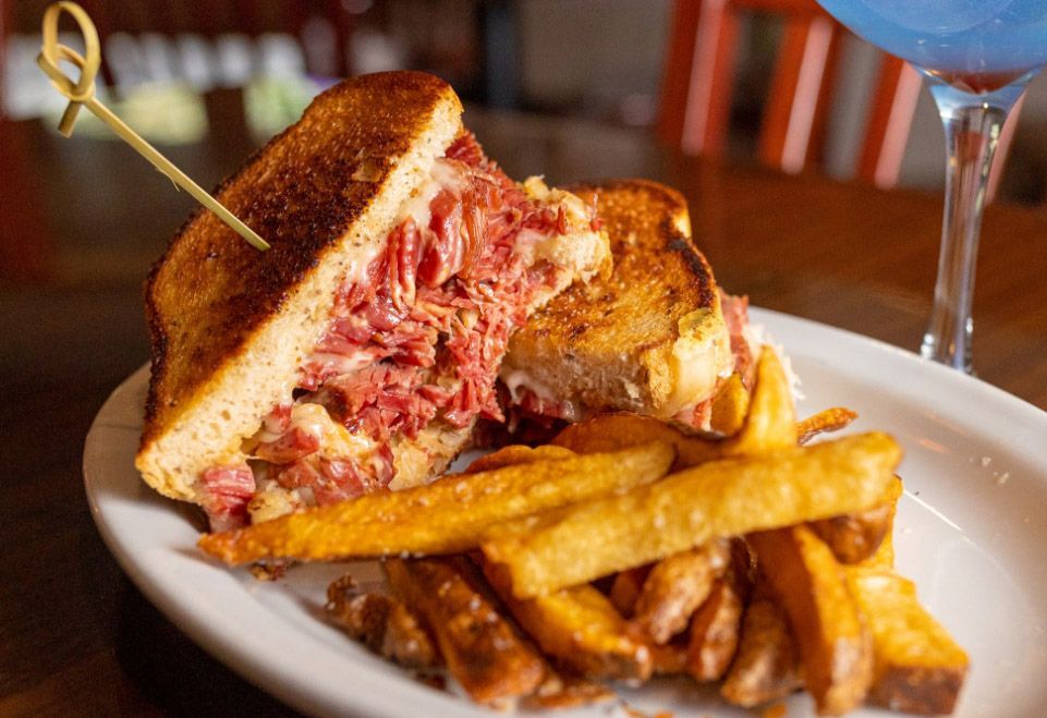 Reuben sandwich with house cut fries.