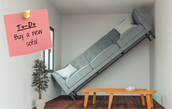 A living room with a large sofa crammed diagonally between two narrow walls and a note that says to-do buy a new sofa.