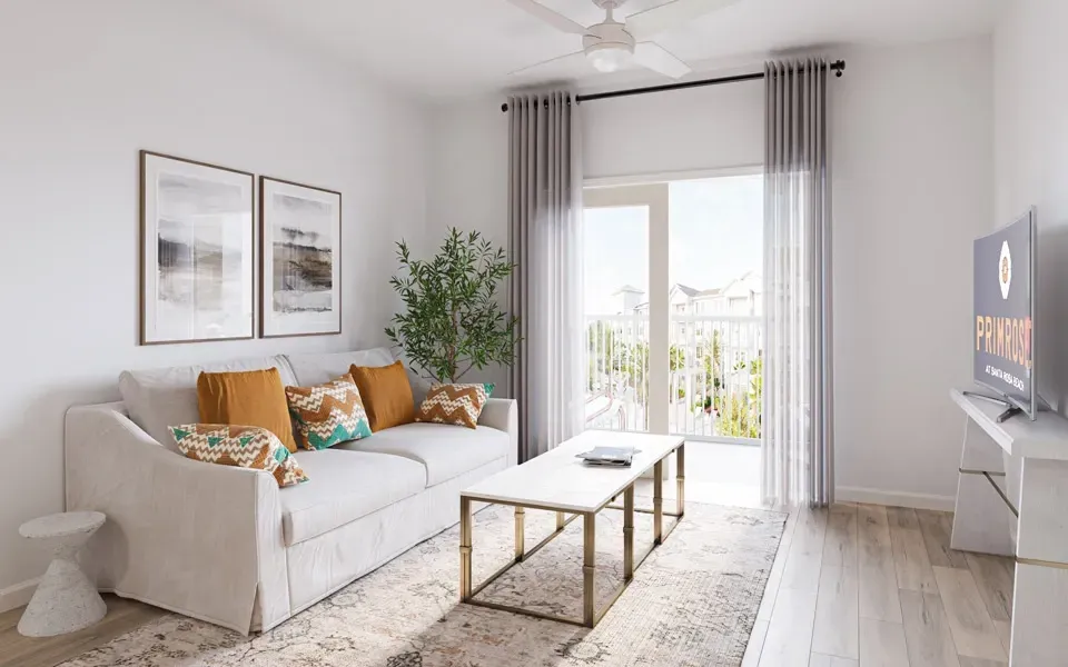 Living room with a white sofa, coffee table, and TV.