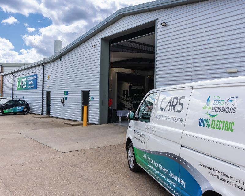 CARS of Grimsby van parked outside the workshop.
