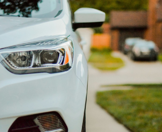 Shiny white Audi after smart repairs.
