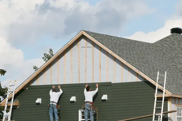 Workers Installing House Siding — Frankfort, NY — Upstate Home Improvements