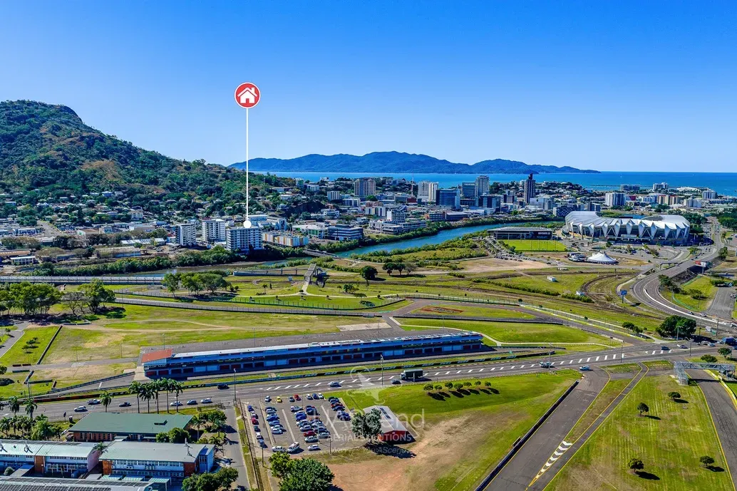 Aerial View of a Coastal City With a Green Hillside — UAScend Aerial Solutions in Townsville, QLD
