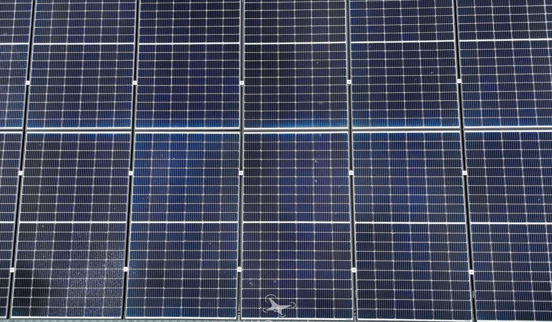 Rows of Blue Solar Panels in a Grid, Seen From Above — UAScend Aerial Solutions in Townsville, QLD