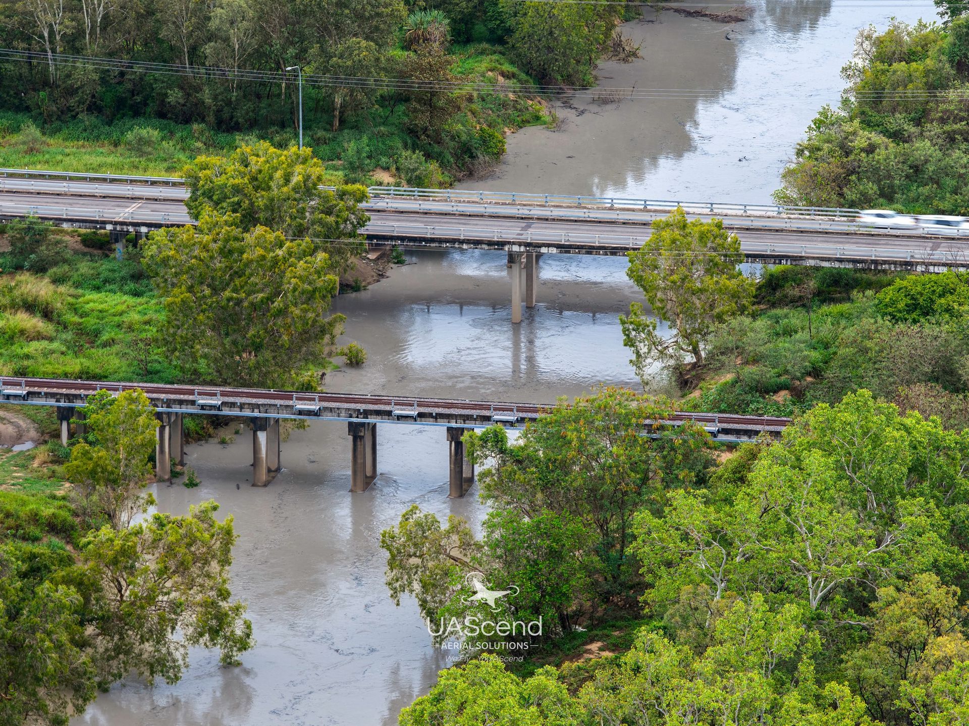Flooded Bridge Across a Muddy River — UAScend Aerial Solutions in Townsville, QLD
