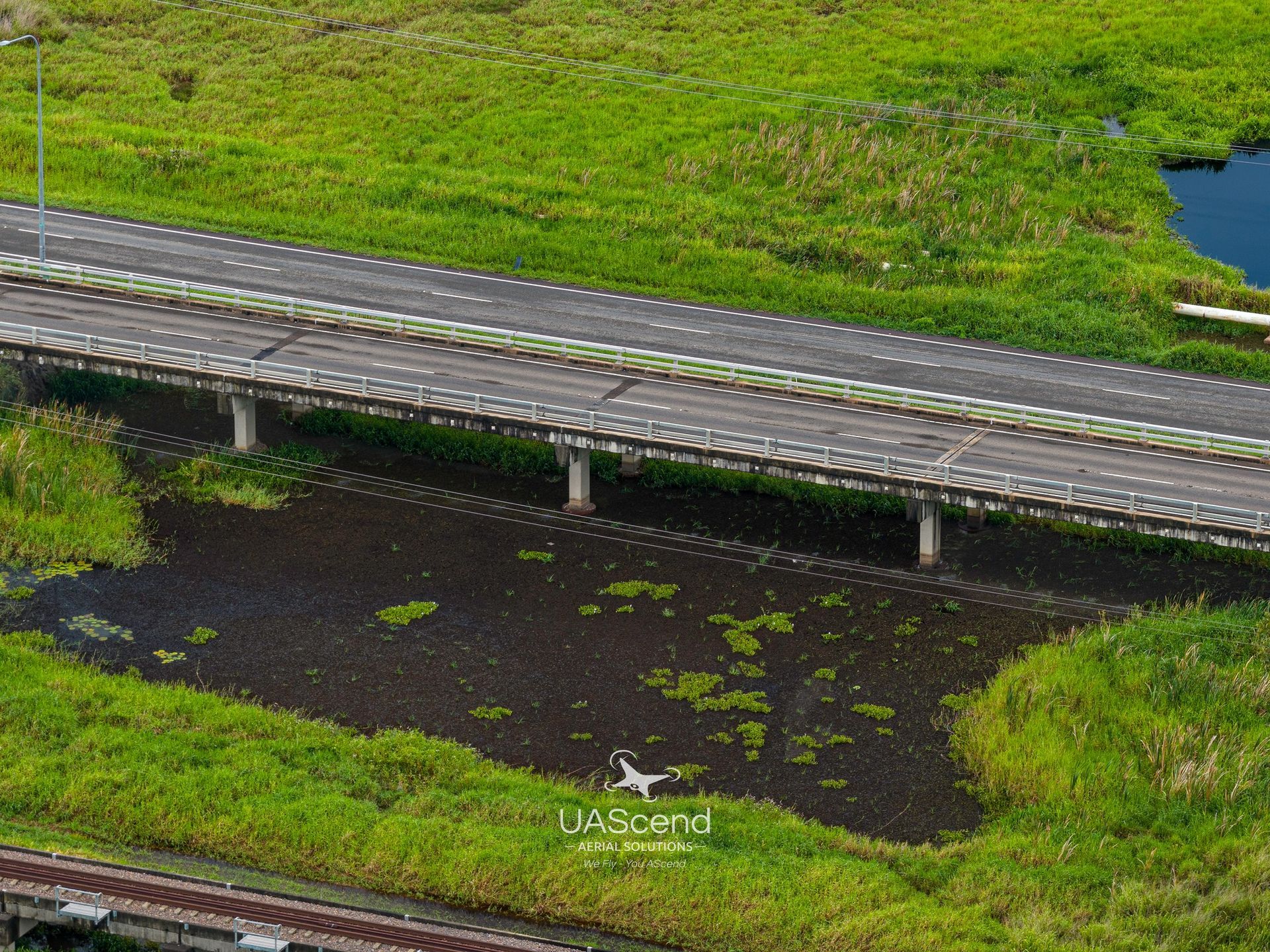 Road Bridge Crossing a Dark Water Channel — UAScend Aerial Solutions in Townsville, QLD