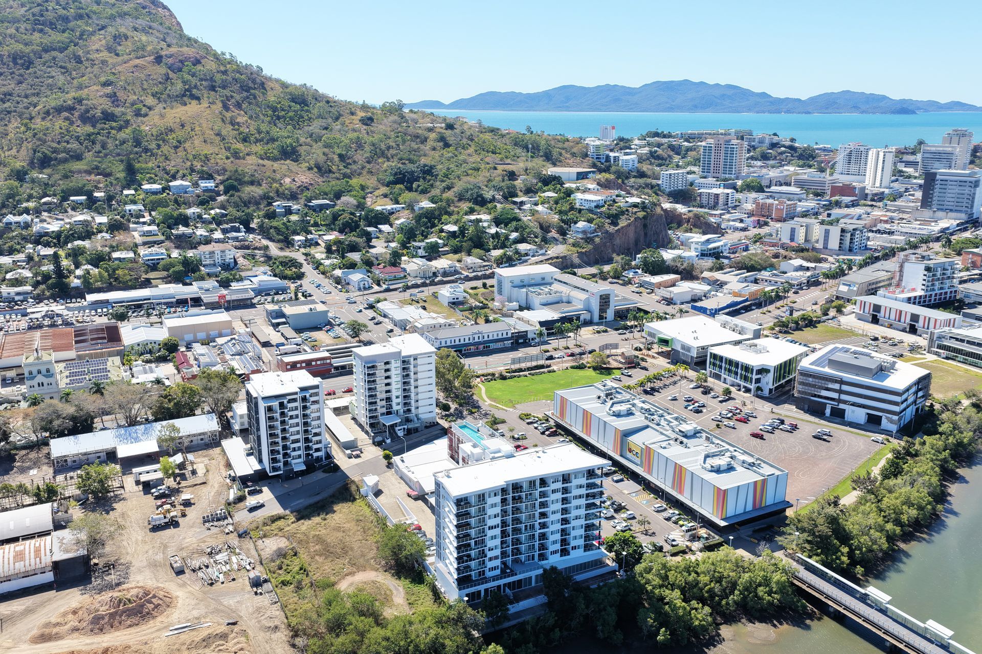 Aerial View of a Coastal Town With Apartment Buildings — UAScend Aerial Solutions in Townsville, QLD