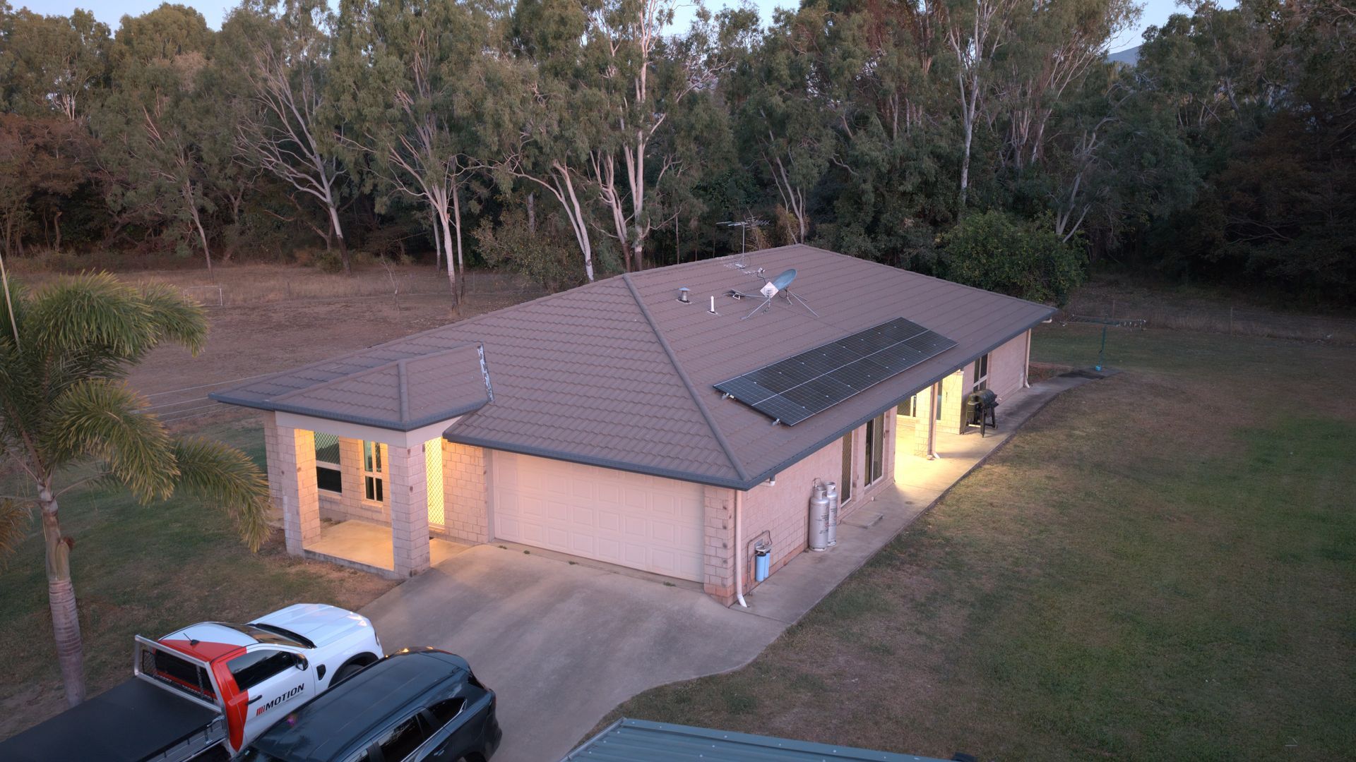 Aerial View of a Single-story House With Lights on — UAScend Aerial Solutions in Townsville, QLD