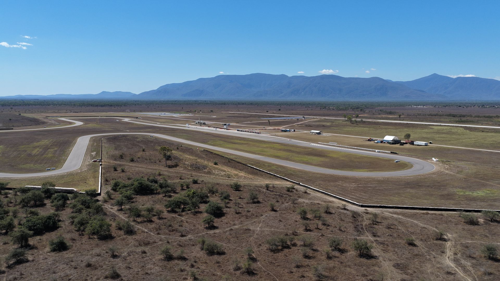 Wide Aerial View of a Rural Airstrip With Winding Roads — UAScend Aerial Solutions in Townsville, QLD
