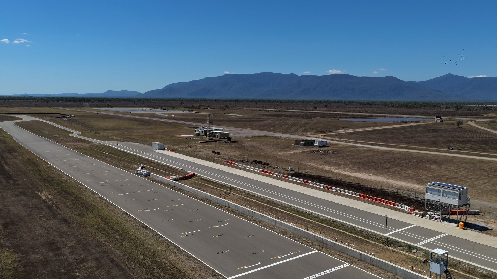 Construction Vehicles Working on a Wide Road — UAScend Aerial Solutions in Townsville, QLD