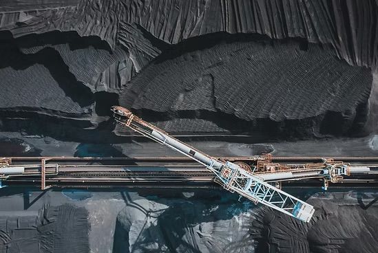 Aerial View of a Coal Conveyor Loading Dark Material — UAScend Aerial Solutions in Townsville, QLD